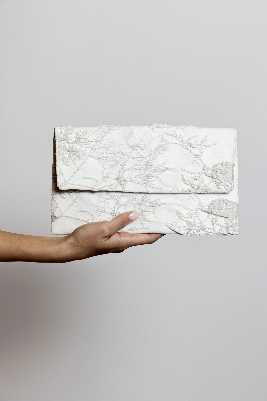 Pochette BLOOM -Eleganza scolpita in luce